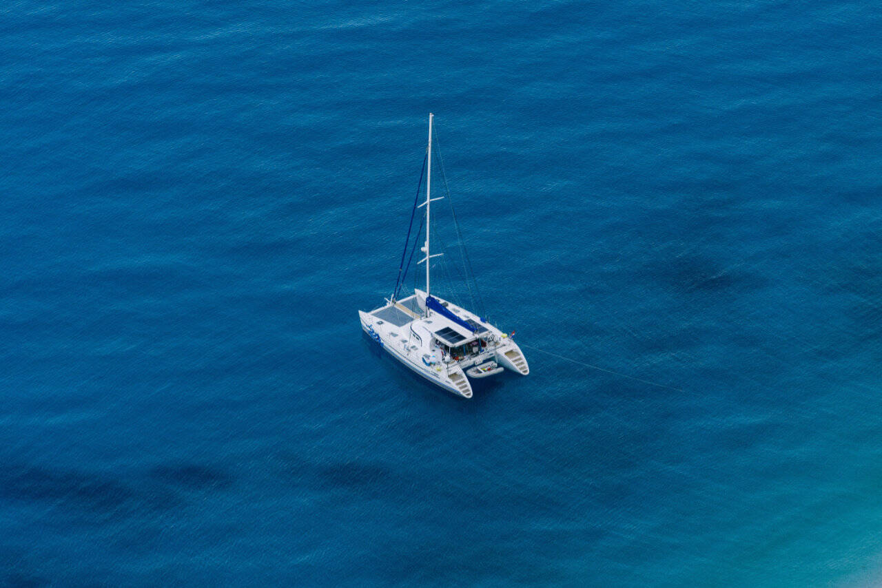 Anchored catamaran in Porto Katsiki, Greece