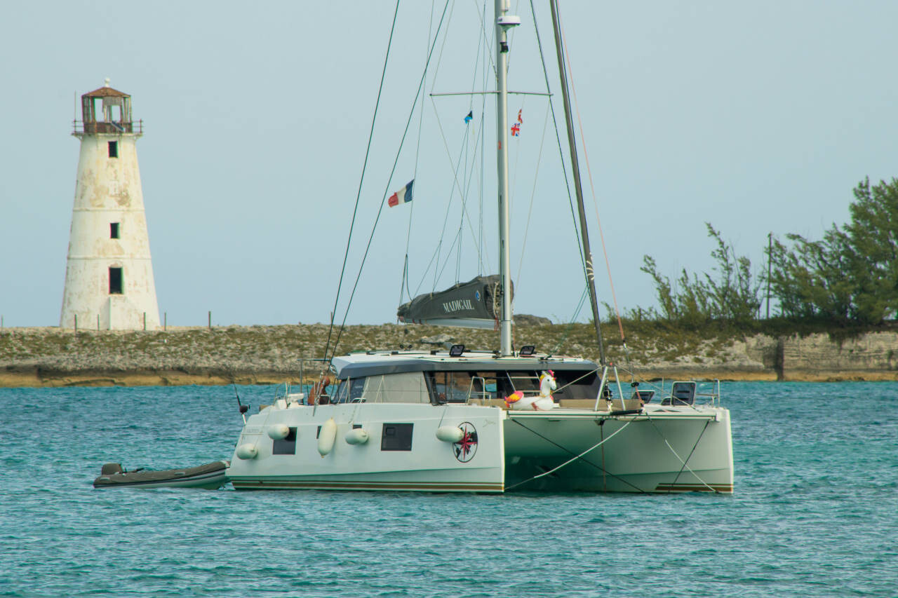 Catamaran with sails down in Nassau Harbour